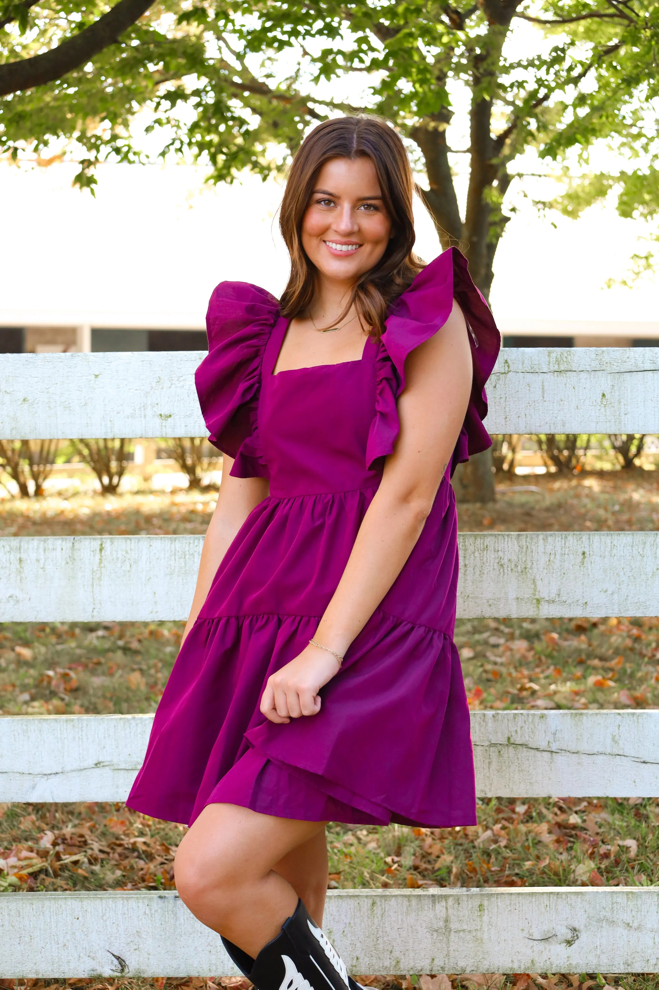 FLUTTER SLEEVE BABYDOLL DRESS IN PLUM